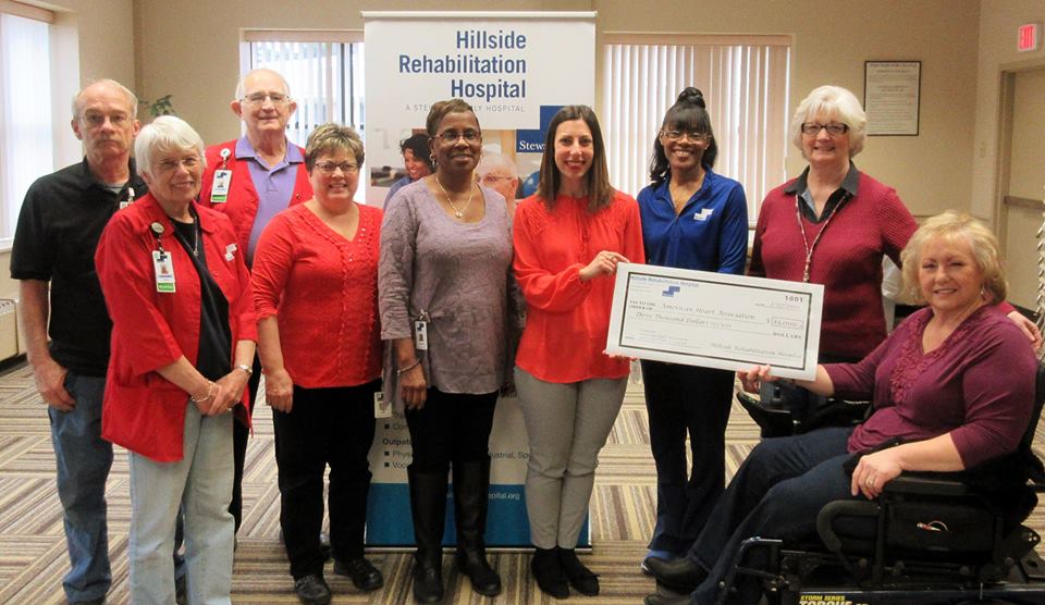 Picture of Hillside staff presenting a $3000 check to the American Heart/Stroke Association