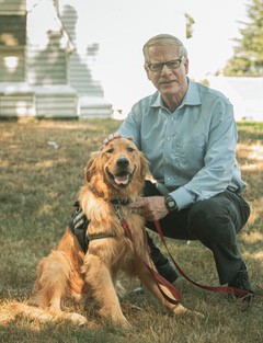 Michael Hamrock, MD, with Sawyer the Dog