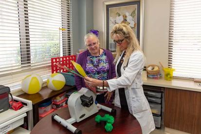 Image of nurse with transitional care patient