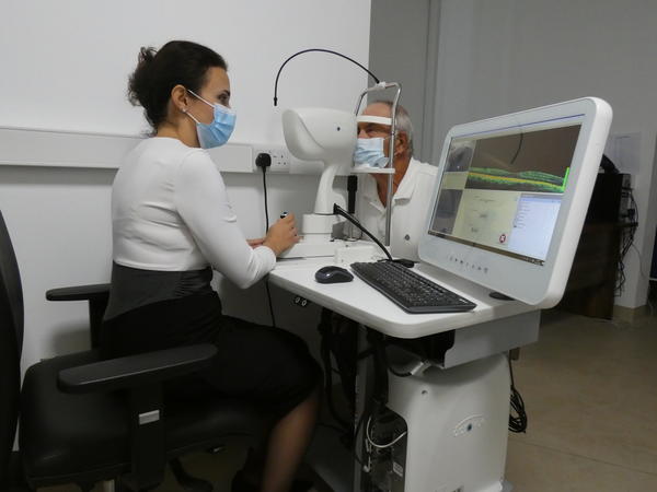 A patient undergoing ophthalmic screening at Gozo General Hospital