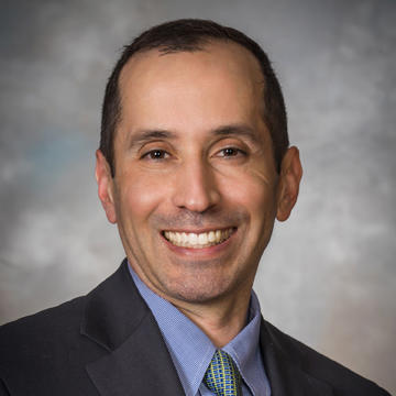 Paul M. Milhoua