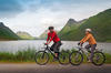 Middle age couple biking